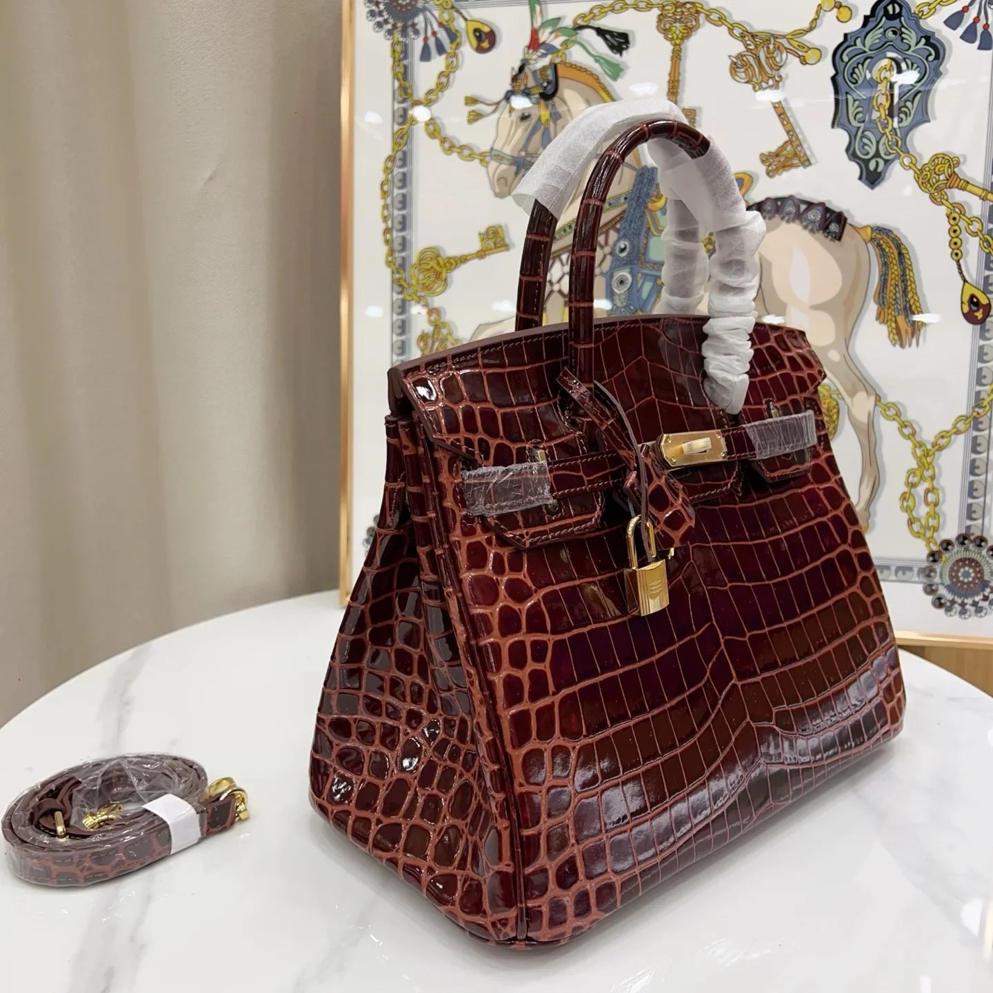 Glossy Bordeaux Red Textured Scaled Structured Top Handle Tote With Radiant Golden Twist Hardware, Matching Lock Tassel And Separate Shoulder Strap