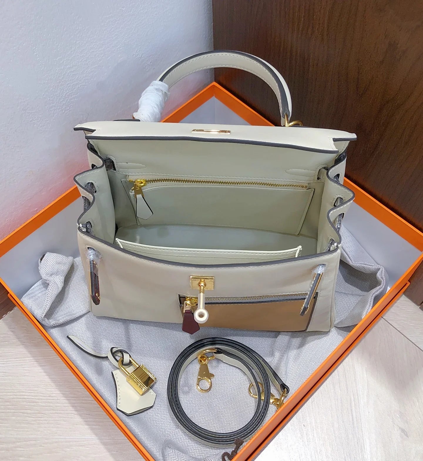 Cream Off-White Multi-Tone Color Block Compact Top Handle Bag With Golden Twist Hardware, Front Zip Compartment And Matching Slim Shoulder Strap