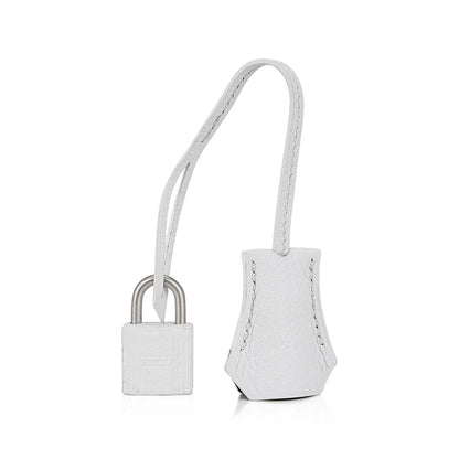 Two-Tone White And Black Structured Top Handle Tote With Brushed Silvery Twist Hardware And Matching Lock Key Pendant Set