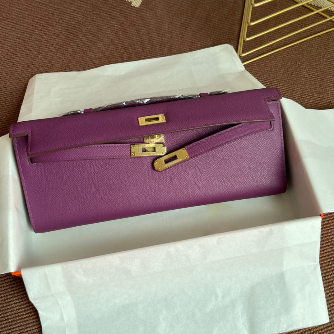 Vibrant Anemone Purple Slim Elongated Evening Clutch With Fine Pebbled Grain Surface And Polished Golden Twist Lock Hardware