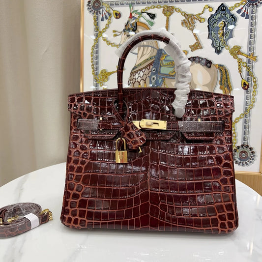 Glossy Bordeaux Red Textured Scaled Structured Top Handle Tote With Radiant Golden Twist Hardware, Matching Lock Tassel And Separate Shoulder Strap